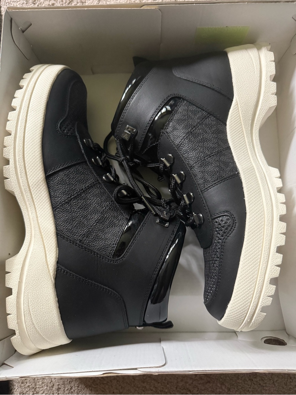 Michael Kors Women’s Black High-Top Lace-Up Sneakers with White Sole